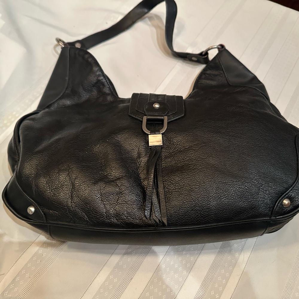 Black Leather Shoulder Bag with silver accents and black fringe